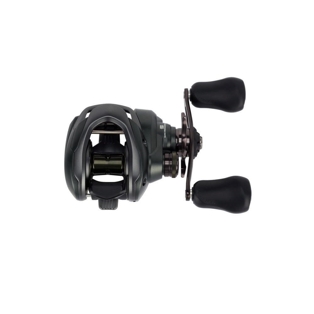 The Shimano Curado 150M Casting Reel 8.1:1 RH (CU150XGM) by Shimano features dual handle grips and a sleek black design, shown from above on a white background—ideal for bass fishing enthusiasts.