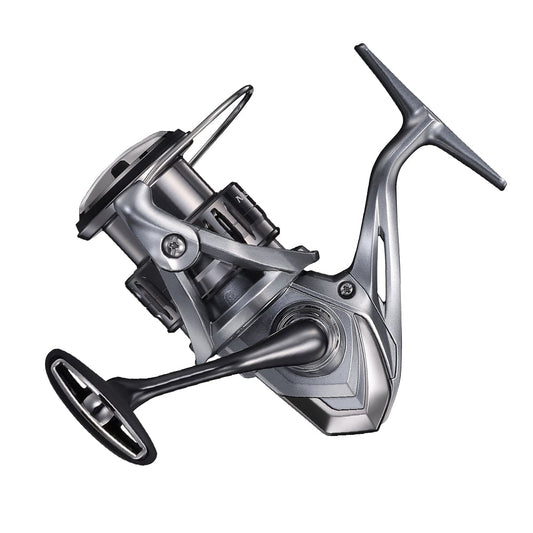 A close-up of the Shimano Nasci FC Spinning Reel (NASC3000HGFC) by Shimano, in silver with a black handle and HAGANE Gear technology, isolated on a white background.