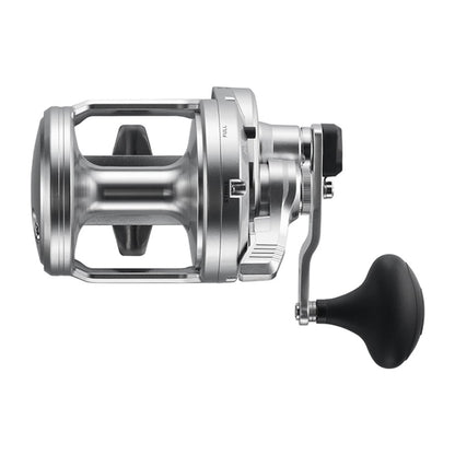The Shimano SpeedMaster 25II 2 Speed Conventional Reel (SPM25II) features a sleek open-frame design and HAGANE Body. With a cylindrical spool and black handle for precision, it offers versatility with its 5.2:1/2.3:1 mechanism, all against a plain white background exuding modern elegance.