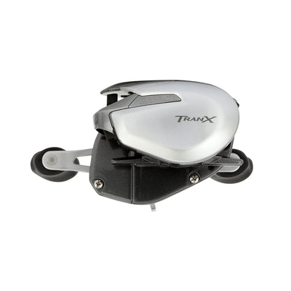 The Shimano Tranx 150A Casting Reel 6.3:1 Right Hand (TRX150A) by Shimano is displayed in silver and black from a side view on a white background, highlighting its suitability for saltwater fishing.