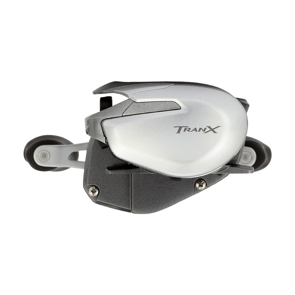 A close-up of the Shimano Tranx 150A Casting Reel 7.2:1 Right Hand (TRX150HGA) by Shimano highlights its compact side profile—ideal for saltwater fishing—against a white background.