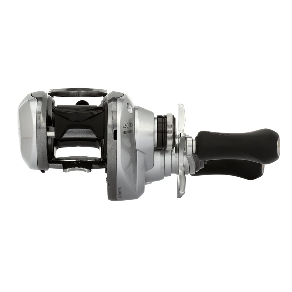 The Shimano Tranx 150A Casting Reel 7.2:1 Left Hand (TRX151HGA) by Shimano is shown in silver and black with a crank handle and visible spool, displayed side profile on white—perfect for dedicated saltwater anglers.