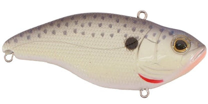 The SPRO Aruku Shad Lipless Crankbaits feature a fish-like design with a white belly, grayish back, speckled pattern, large lifelike eyes, and a small red mark near the mouth. Metal rings facilitate line attachment and accommodate Gamakatsu treble hooks seamlessly.