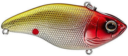 The SPRO Aruku Shad Lipless Crankbait features a shiny gold and red body with a textured scale pattern, a small red dot near its tail, realistic detailing, metal attachment loops, and Gamakatsu treble hooks for enhanced angling.