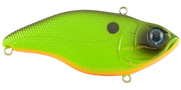 The SPRO Aruku Shad Lipless Crankbait is a green and orange lure with a textured fish shape, large blue eye, and two metal loops for line attachment. It features Gamakatsu treble hooks for enhanced performance.