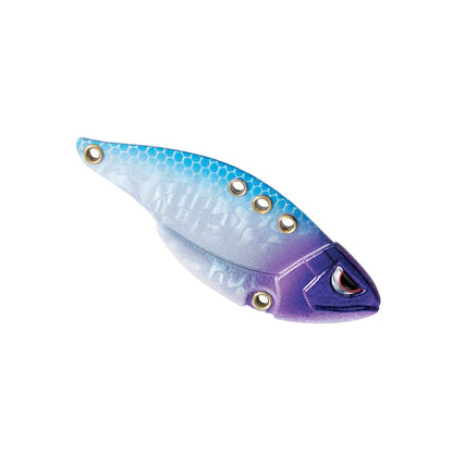 The SPRO Carbon Blade TG Blade Bait is a vibrant fishing lure designed for bass anglers and cold water fishing. It showcases a gradient design that transitions from light blue to purple with a metallic finish, featuring several holes along the top edge. The front of the lure is shaped like a fish head, complete with eye detail.