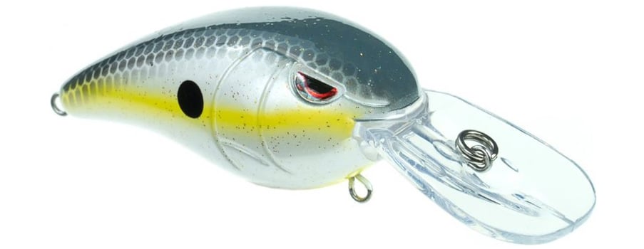 The SPRO RkCrawler MD 55 Crankbait resembles a small fish, featuring a silver body with a yellow stripe, red eyes, and a black spot near the head. It includes Gamakatsu hooks and a transparent curved lip for shallow dives.