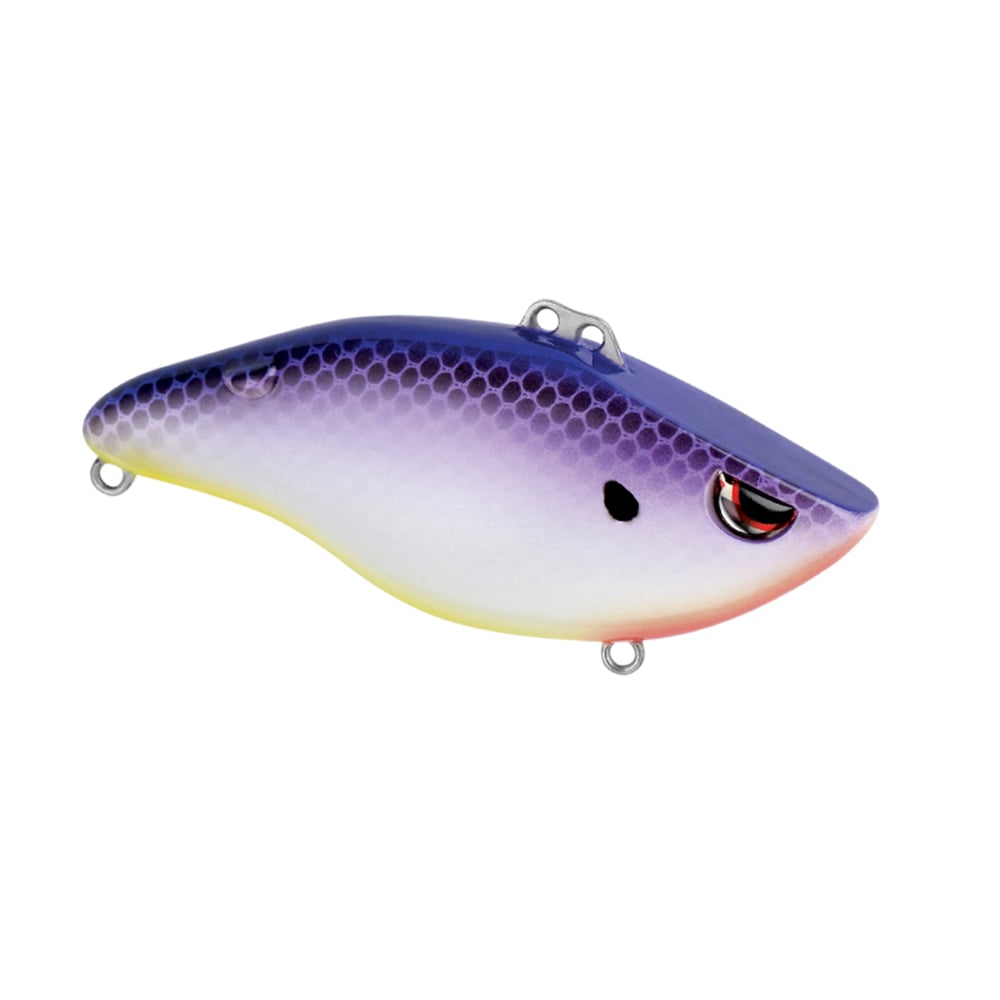 The SPRO Wameku Shad Lipless Crankbait is a colorful lure shaped like a small fish, featuring a purple and blue gradient back, white underbelly, yellow accents, and a red, black, and white painted eye.