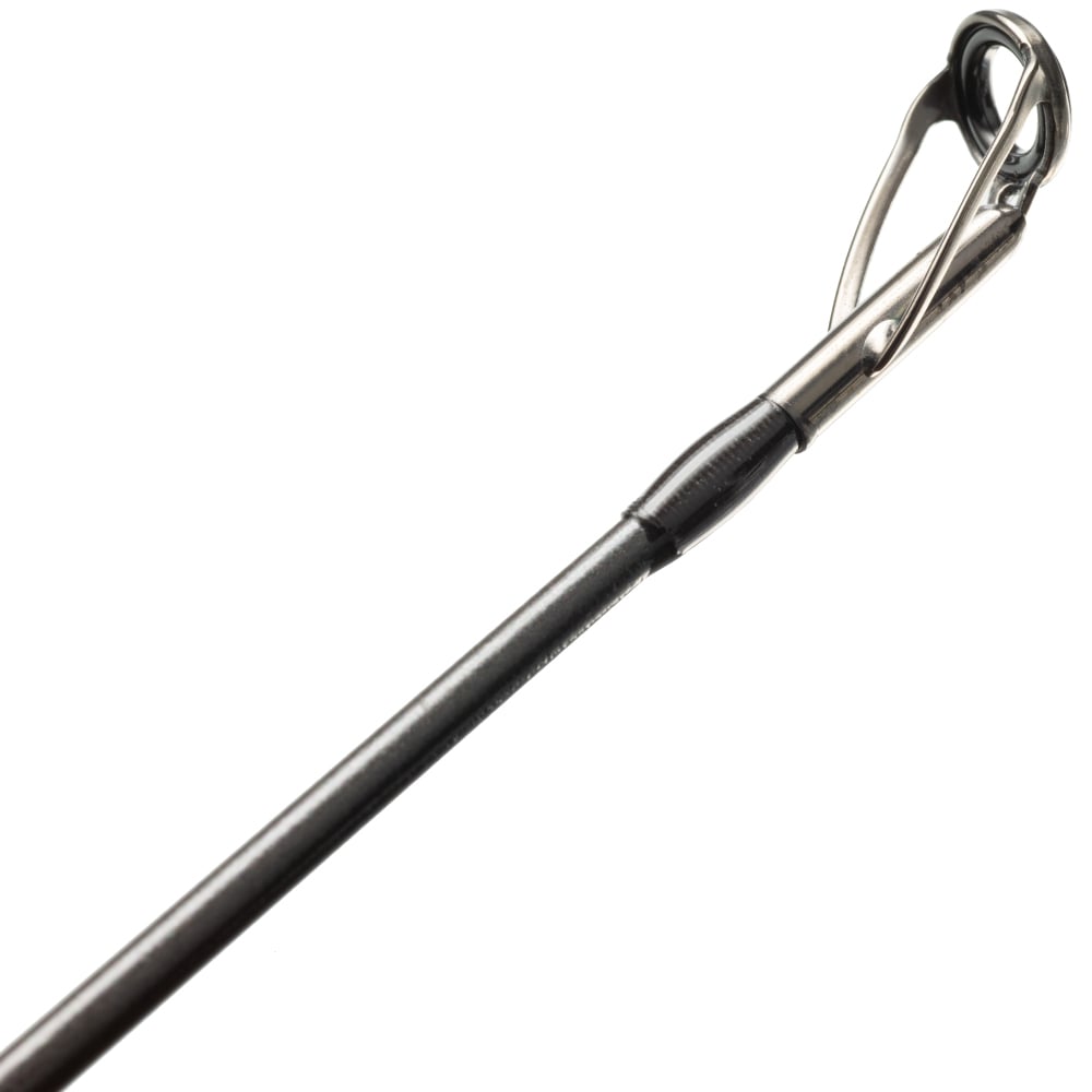 Close-up of the St. Croix Avid Trek Travel Casting Rod 6'6” Medium Heavy (ATC66MHF3) tip, featuring a metal guide ring and showcasing St. Croix's Integrated Poly Curve technology for smooth line flow.