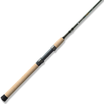 The St. Croix Avid Trek Travel Spinning Rod 7'0" Medium Light (ATS70MLF3) features a long, light brown cork handle and metallic reel seat, extending to a slender graphite pole shown diagonally on a white background.
