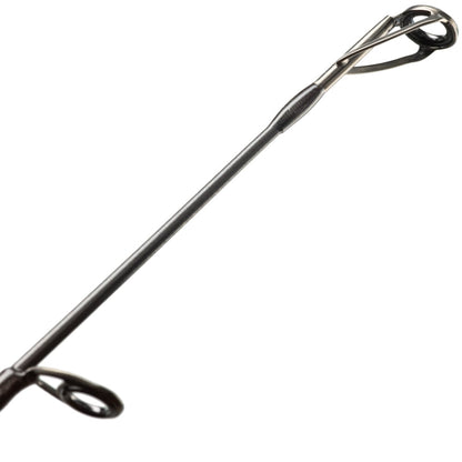 Close-up of the St. Croix Avid Trek Travel Spinning Rod 7'0” Medium Heavy (ATS70MHF3), showing its metal guide rings and SCIII carbon rod shaft against a white background.