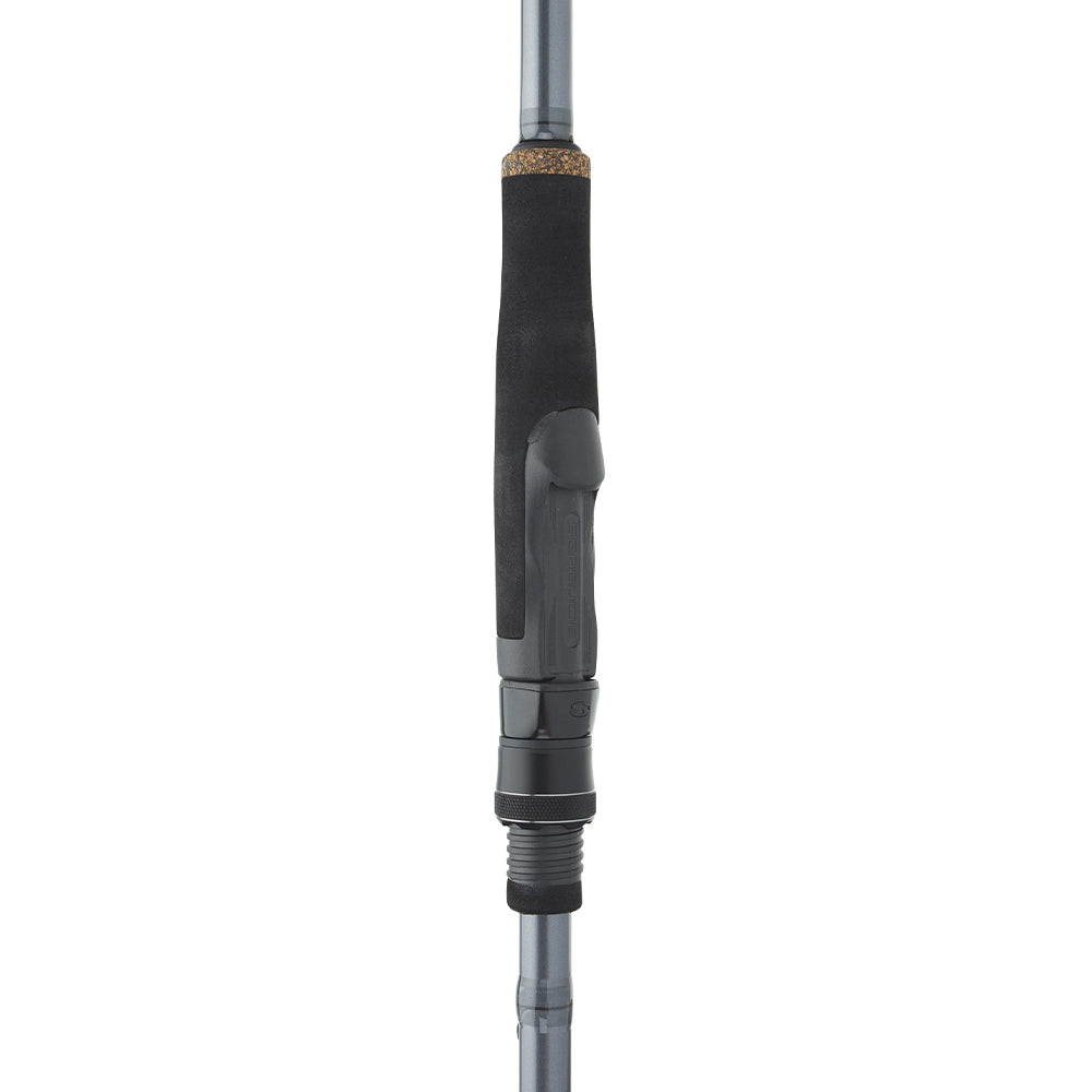 A close-up of the St. Croix Black Bass Spinning Rod 6'8" Medium (RIS68MXF) handle, featuring a black foam grip, reel seat, metallic accents, and the carbon fiber blank visible above and below the grip.