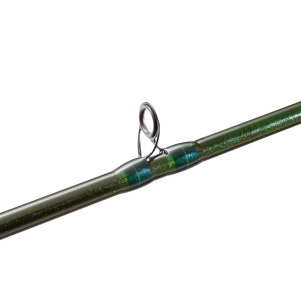 Close-up of the St. Croix Eyecon Casting Rod 7’0” Medium Heavy Bounce-N-Troll (EYC70MHM). This walleye rod features a glossy green finish with blue accents and metallic guide ring. Perfect for walleye fishing. White background.