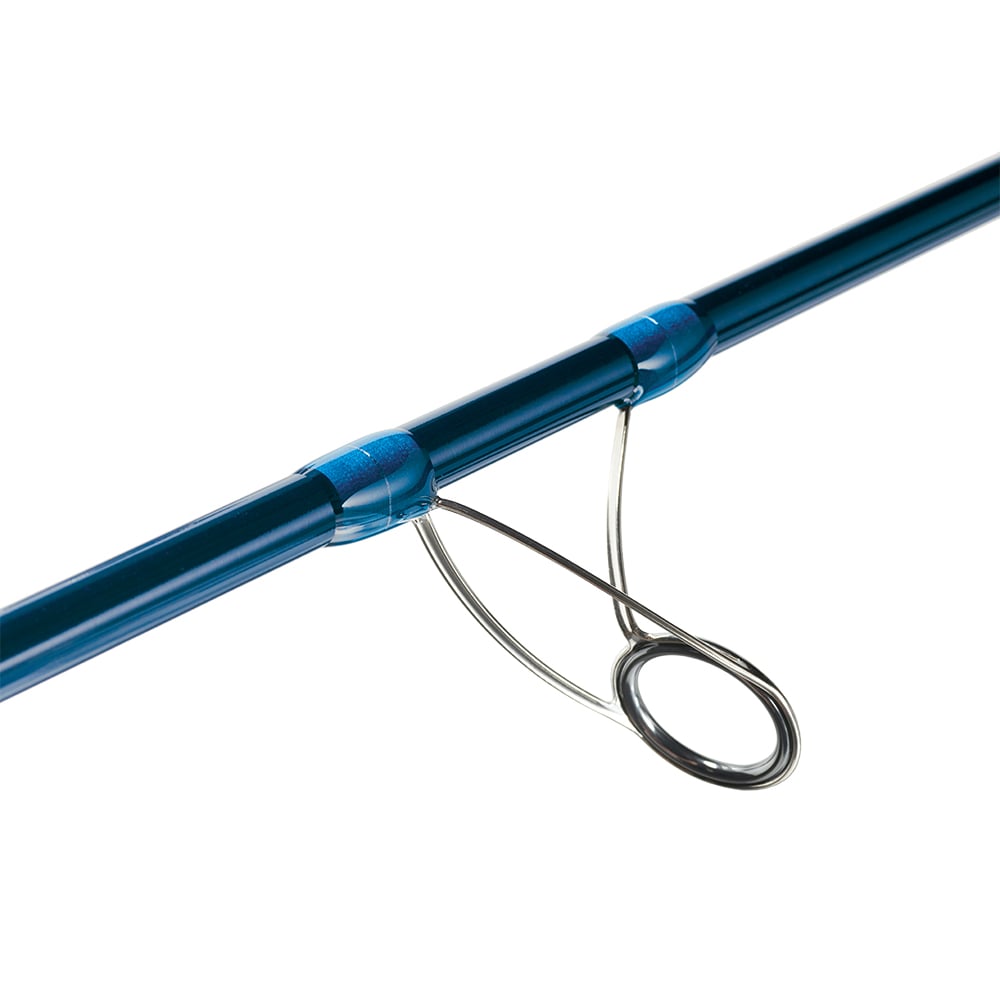 Close-up of a blue St. Croix Legend Surf Spinning Rod 10'6" Medium Heavy 2 Piece (GSS106MHMF2), highlighting one of its metal line guides secured with blue wrappings.