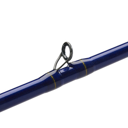 Close-up of a blue St. Croix Legend Tournament Bass Casting Rod by americanlegacyfishing, model LBTC68MXF, featuring SCIV+ Carbon Fiber and gold accents near the guide ring with Advanced Reinforcing Technology. Set against a plain white background.