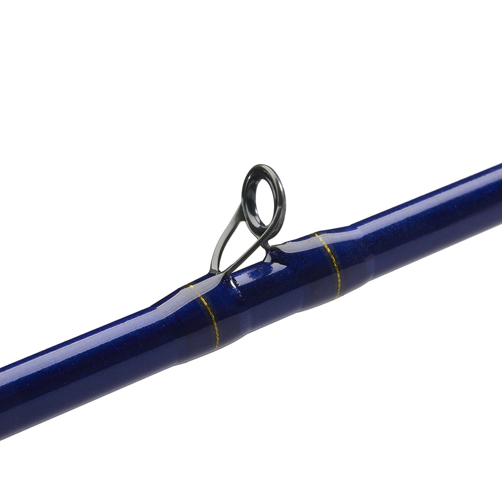 Close-up of the St. Croix Legend Tournament Bass Casting Rod 7'2" Medium Heavy Finesse Carbon Cranker (LBTC72MHMF) with a blue finish, metal guide ring, and gold accents against a white background—ideal for serious bass anglers.