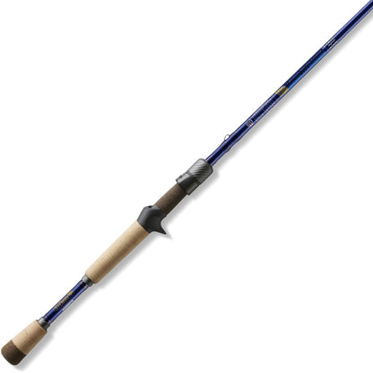 Meet the St. Croix Legend Tournament Bass Casting Rod LBTC68MXF from americanlegacyfishing, a 6'8" medium jerkbait rod with a blue finish and cork handle. Crafted with SCIV+ Carbon Fiber and Advanced Reinforcing Technology, it boasts a dark reel seat and metal guides for exceptional performance.