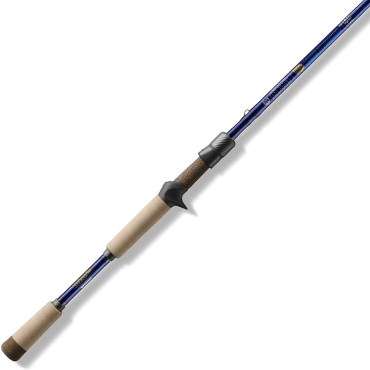 A St. Croix Legend Tournament Bass Casting Rod 7'10" Heavy Big Cranker (LBTC710HM) with tan cork handle, SCIV+ Carbon Fiber, and black reel seat is shown diagonally on a white background.