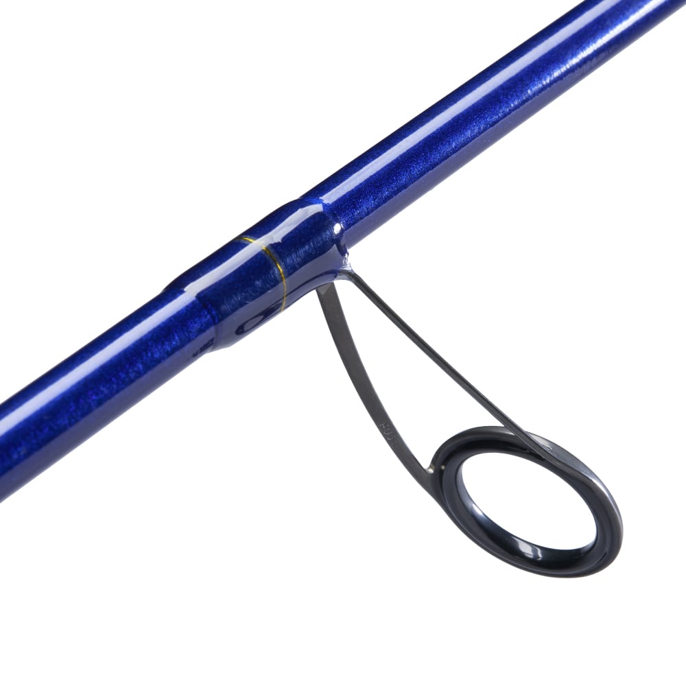 A close-up of a blue St. Croix Legend Tournament Bass Spinning Rod 7'3" Medium Power Finesse (LBTS73MXF), highlighting one of its black line guides.