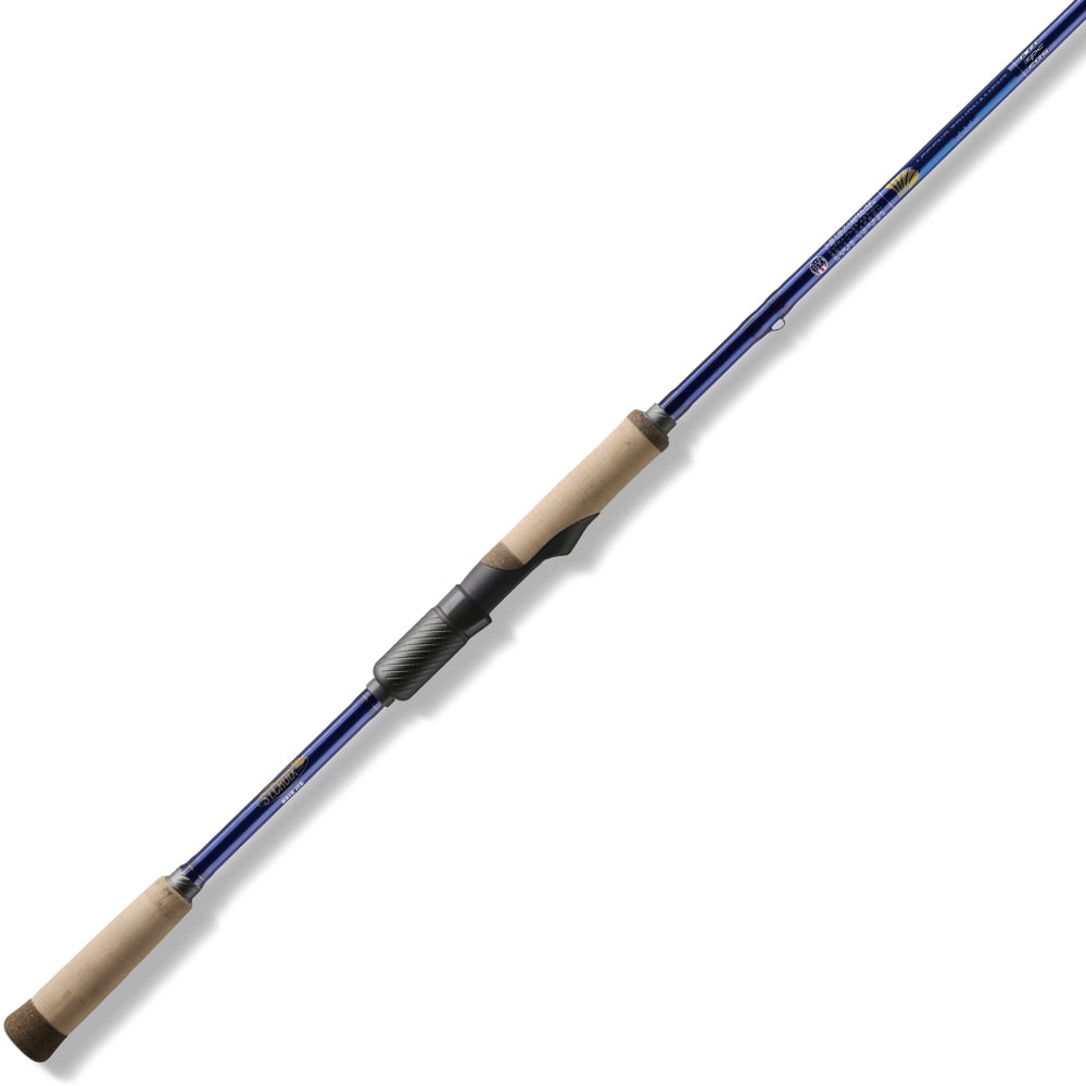 The St. Croix Legend Tournament Bass Spinning Rod 7'10" Medium Swimming Baits by St. Croix, featuring cork handles, SCIV+ Carbon Fiber construction, and a black reel seat, is shown diagonally on a white background.