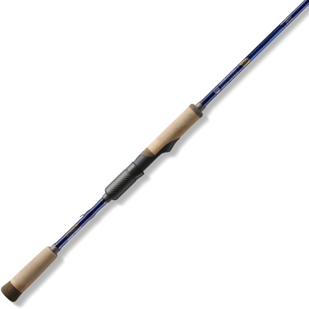 The St. Croix Legend Tournament Bass Spinning Rod 7'3" Medium Power Finesse (LBTS73MXF) features a blue finish, light cork handles, and a black reel seat—designed for finesse techniques—shown on a white background.