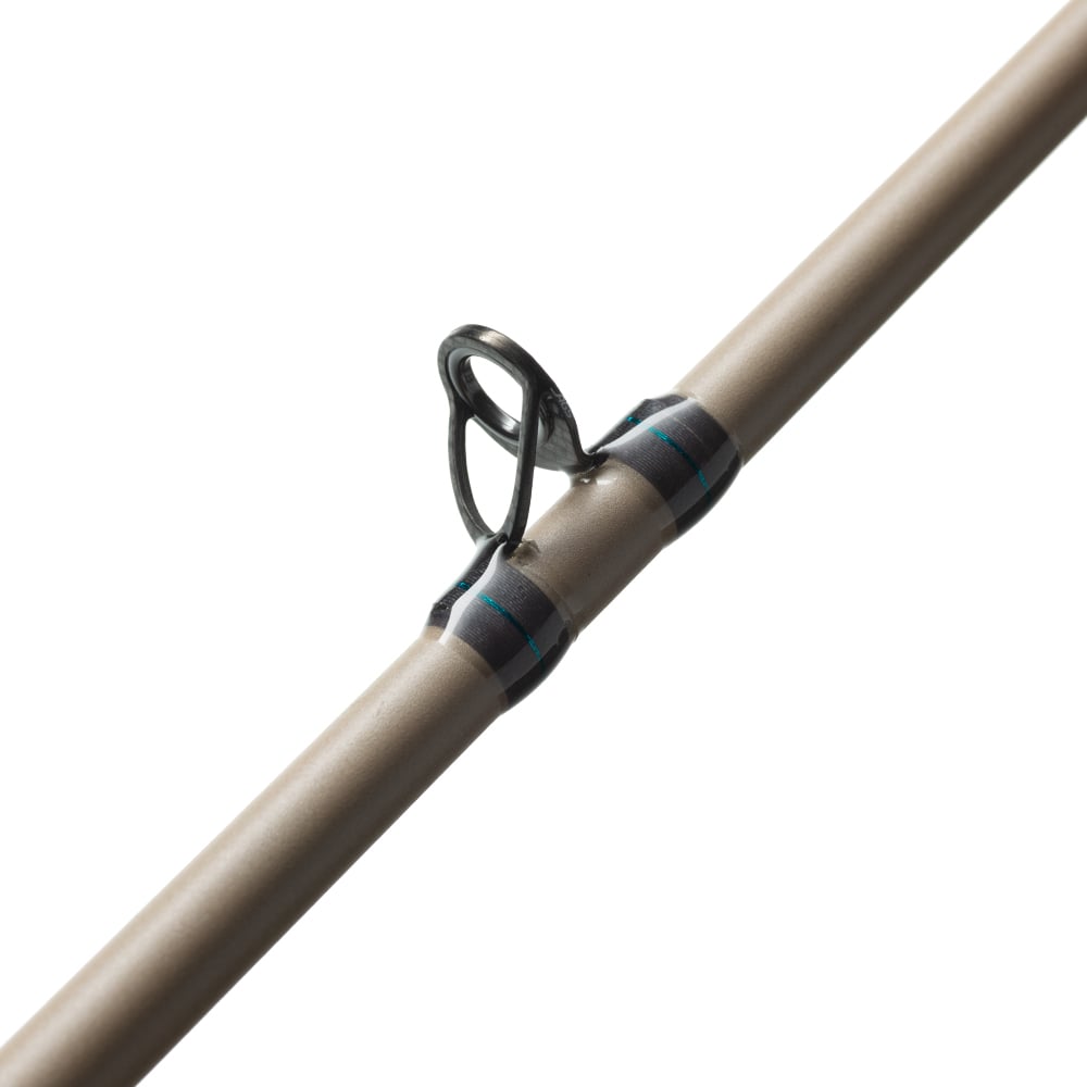 Close-up of the St. Croix Legend Xtreme Inshore Casting Rod 7'0” Medium Heavy (XSC70MHF) highlights its metal guide ring with dark wrapping, showing off the durable St. Croix design against a plain white background.