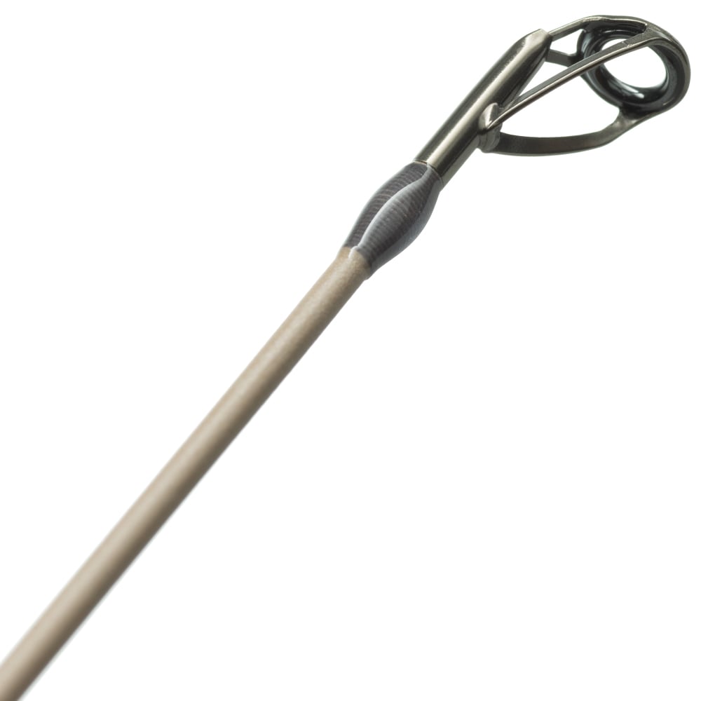 Close-up of the tip of a St. Croix Legend Xtreme Inshore Casting Rod 7'0” Medium Heavy (XSC70MHF) by St. Croix, highlighting the guide ring and part of the rod shaft against a white background.