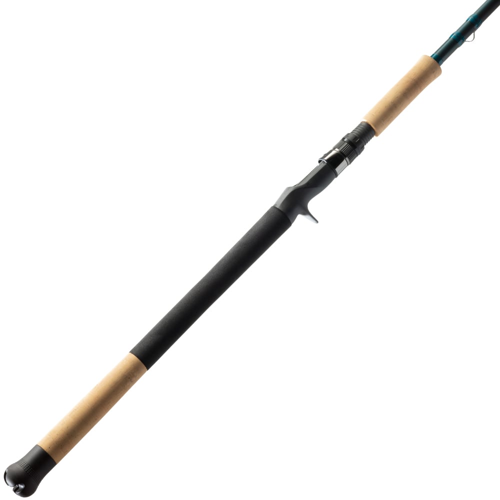 The St. Croix Mojo Inshore Casting Rod 7'9" Extra Heavy (JIC79XHMF) by St. Croix, shown with a black and tan handle and trigger grip, is positioned diagonally on a white background—ideal for premium inshore saltwater fishing.