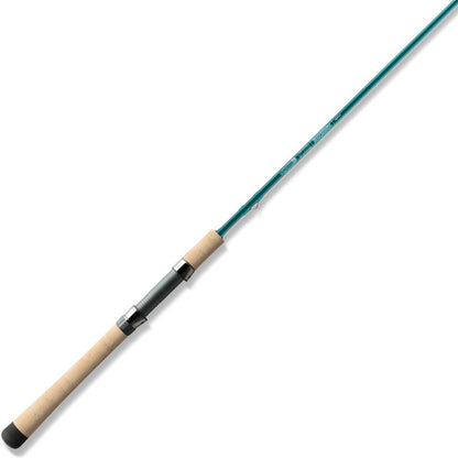 The St. Croix Mojo Inshore Spinning Rod 7'0" Medium (JIS70MF) features a cork handle, teal blue shaft, and slim lightweight design—perfect for quality inshore saltwater fishing. Reel seat is metallic gray with silver accents.