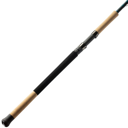 A close-up of the St. Croix Mojo Inshore Spinning Rod 7'6" Medium Heavy (JIS76MHF) shows its cork handle, black foam grip, and metal reel seat on a white background—ideal for inshore anglers seeking quality from St. Croix.