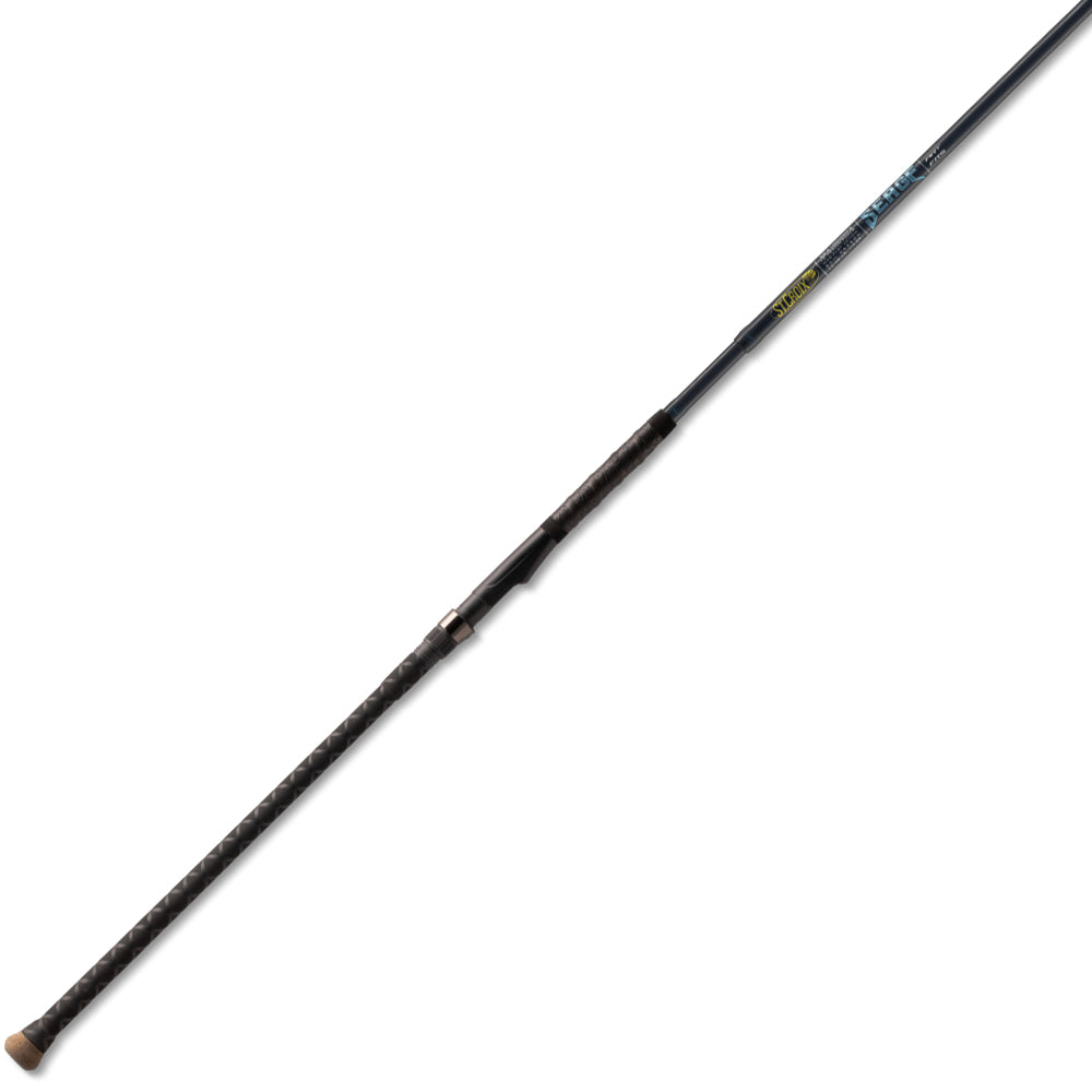 The St. Croix Seage Surf Series Spinning Rods 7’0” Medium 1pc (SES70MMF) by St. Croix features a slender blue shaft, textured black handle, and reel seat, shown diagonally on a white background.