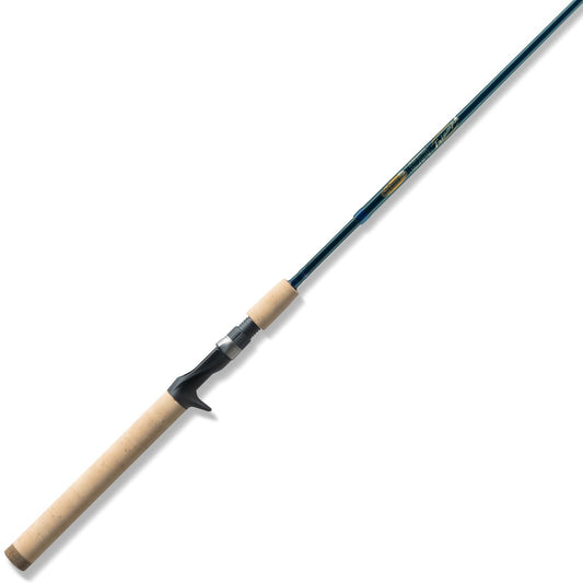A St. Croix Triumph Travel Casting Rod 6'6” Medium Heavy (TCR66MHF4) with a cork handle, dark blue SCII carbon shaft, and trigger grip reel seat is shown on a white background.