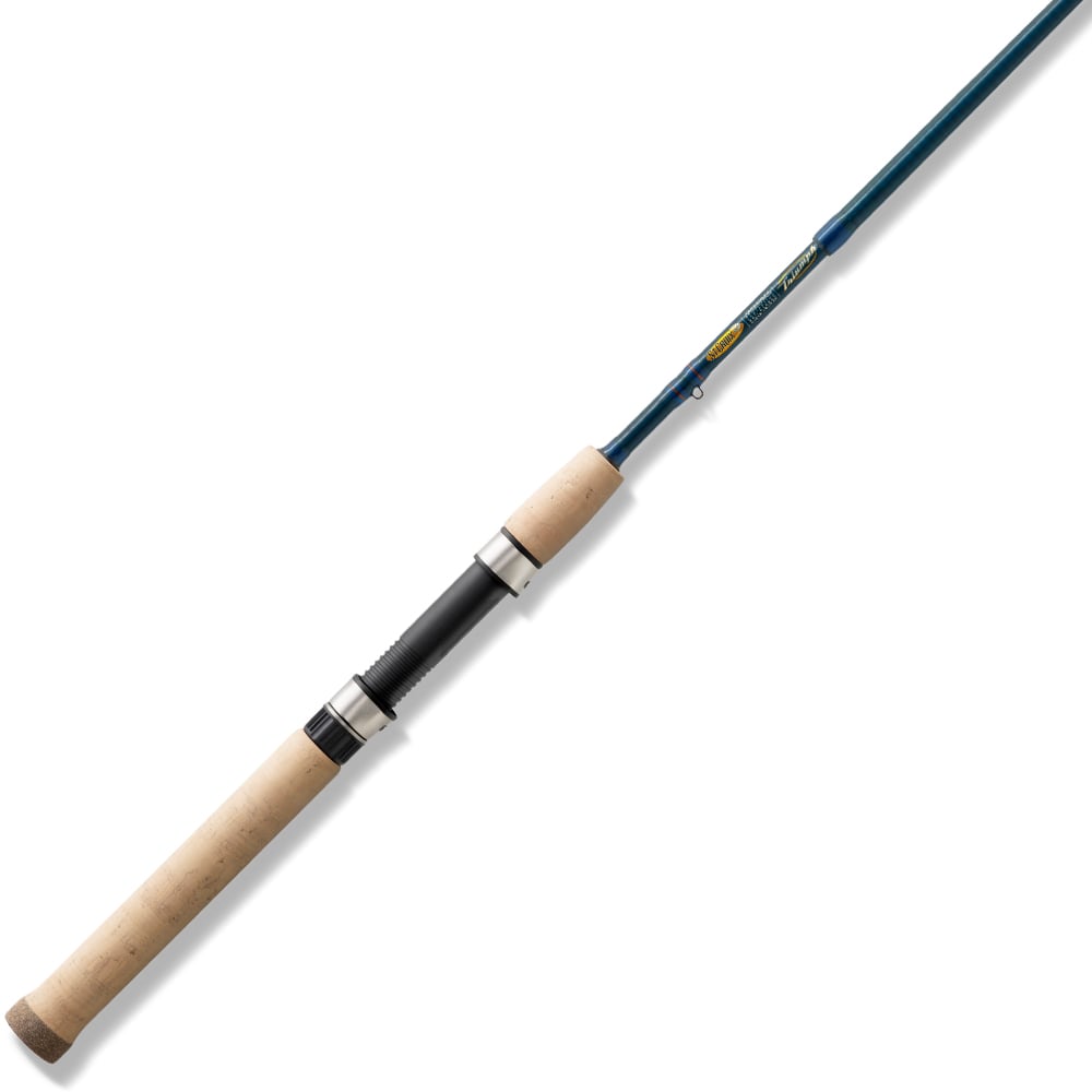 The American Legacy Fishing St. Croix Triumph Travel Spinning Rod 6'6” Medium Light (TSR66MLF4) boasts a sleek dark blue finish, light brown cork handle, and metal reel seat. It tapers elegantly for agile casting, ideal for your next adventure.