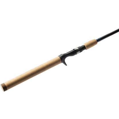 A St. Croix Triumph Casting Rod 6'6" Medium Heavy (TCR66MHF), featuring a cork handle and black reel seat, made from Premium SCII carbon, is displayed diagonally on a white background with the rod tip out of view.
