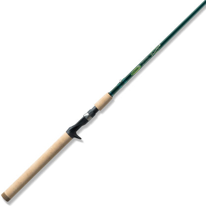 A St. Croix Triumph Inshore Casting Rod 7'0" Medium Heavy (TRIC70MHF) with a light wood handle and black reel seat extends diagonally across a white background.