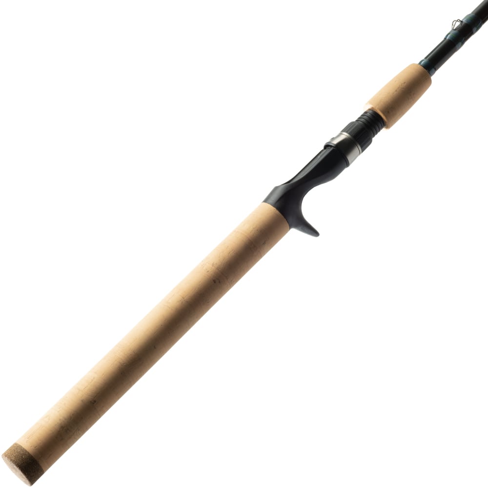 A close-up of the St. Croix Triumph Inshore Casting Rod 7'0” Medium Heavy (TRIC70MHF) shows its light cork handle and black reel seat, made with SCII carbon for medium heavy action, isolated on a white background.