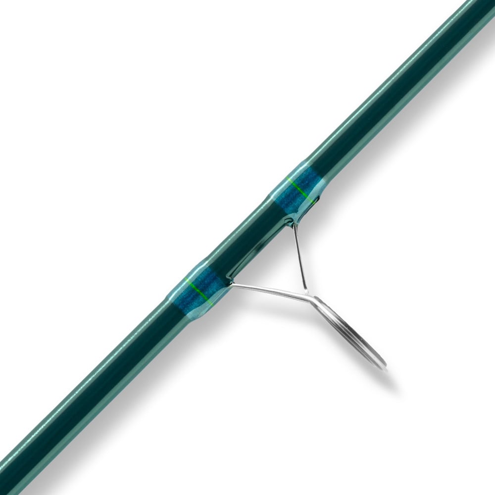 Close-up of the St. Croix Triumph Inshore Spinning Rod 7'0” Heavy (TRIS70HF) with a metal guide ring, secured by blue and green thread wrap, on a white background—ideal for serious inshore anglers.