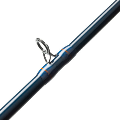 Close-up of the St. Croix Triumph Musky Casting Rod 7'6” Medium Heavy (TMR76MHF), featuring a metal guide ring secured with blue and orange thread wraps on its medium heavy blank.