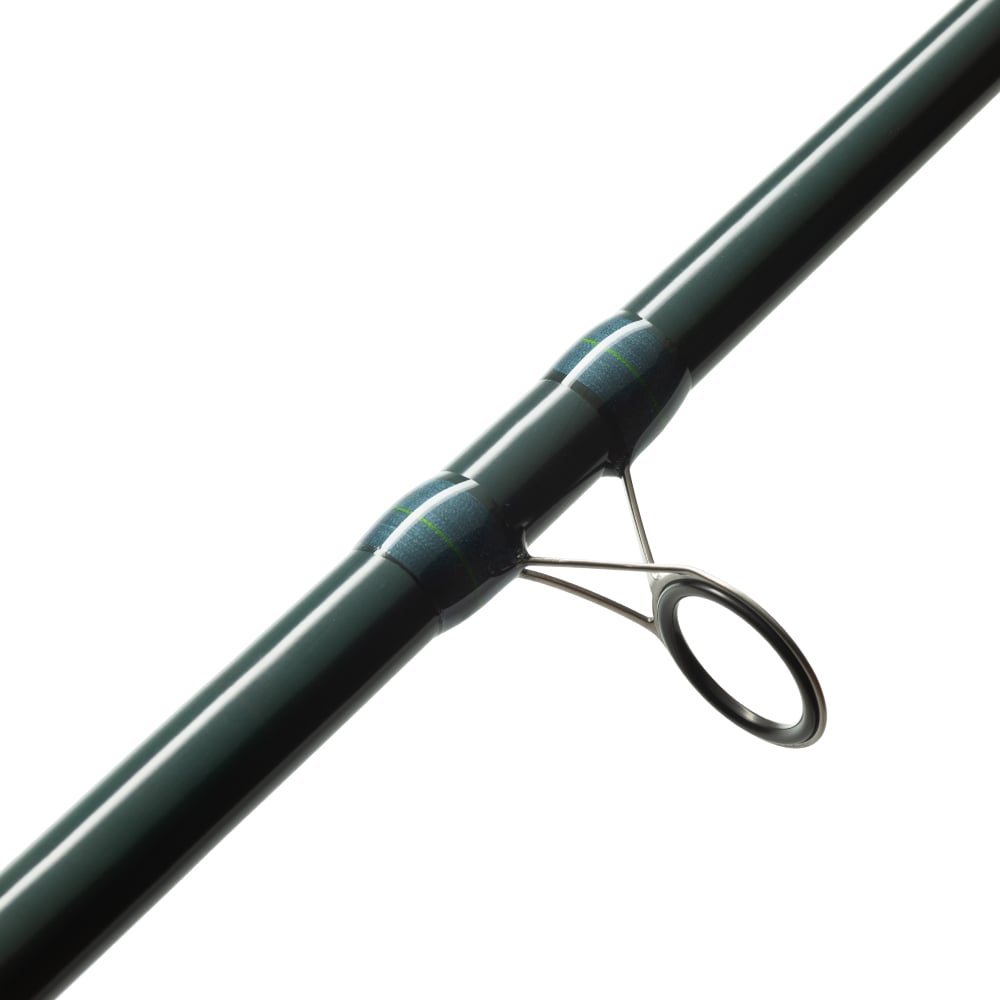 Close-up of the St. Croix Triumph Surf Spinning Rod 10'0” Medium (TSF100M2), featuring a metal guide ring secured with blue-green thread wraps. The clean white background highlights details perfect for long distance casting.