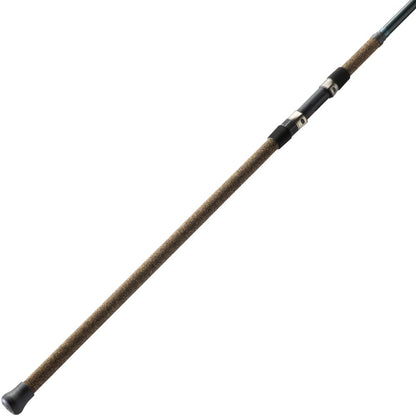 A close-up of the St. Croix Triumph Surf Spinning Rod 10'0” Medium (TSF100M2) handle with cork grip and black reel seat, displayed diagonally on a white background.