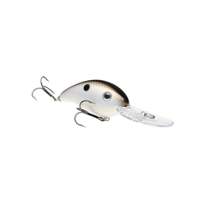 The Strike King 3XD Crankbait is a bass fishing lure with a white body, black tail spot, black top, silver scales, blue eye, two treble hooks, and a clear plastic lip for diving.