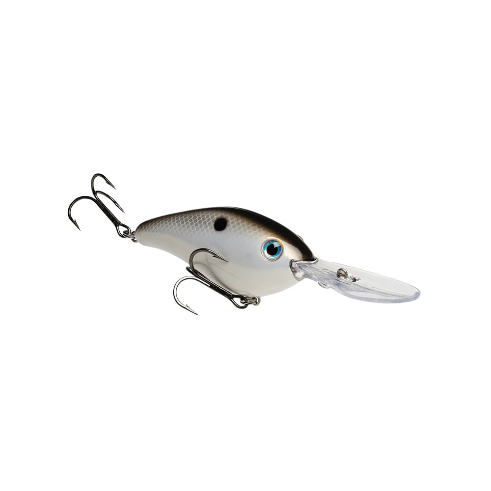The Strike King 6XD Crankbait, designed for deep diving, features a realistic fish design with a shiny silver body and black eye markings. Its long, clear plastic lip and curved bill ensure effortless diving. Two sharp treble hooks complete this lure against a plain white background.
