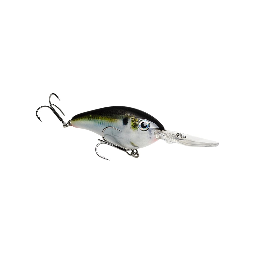 The Strike King 6XD Crankbait is a realistic fish-shaped lure with a black-green back, metallic sides, and white belly. Its curved bill enables deep diving, and it has two treble hooks: one at the bottom and another near the tail.