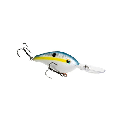 The Strike King 6XD Crankbait has a blue top, yellow stripe, and white underside, featuring a fish-like shape with two black dots. Its curved bill enhances diving action and is equipped with two treble hooks for effective fishing.