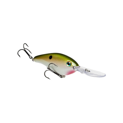 The Strike King 6XD Crankbait, in green and yellow with a realistic fish-eye pattern and smooth finish, features a deep diving capability thanks to its clear plastic lip with a curved bill design, making it ideal for attracting larger catches.