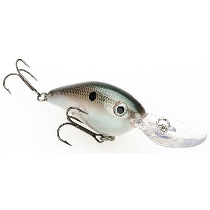 The Strike King 8XD Crankbait by Strike King features a silver and green fish-like body, black spot, two treble hooks, and a clear diving lip—an ideal deep-diving lure for bass fishing enthusiasts.