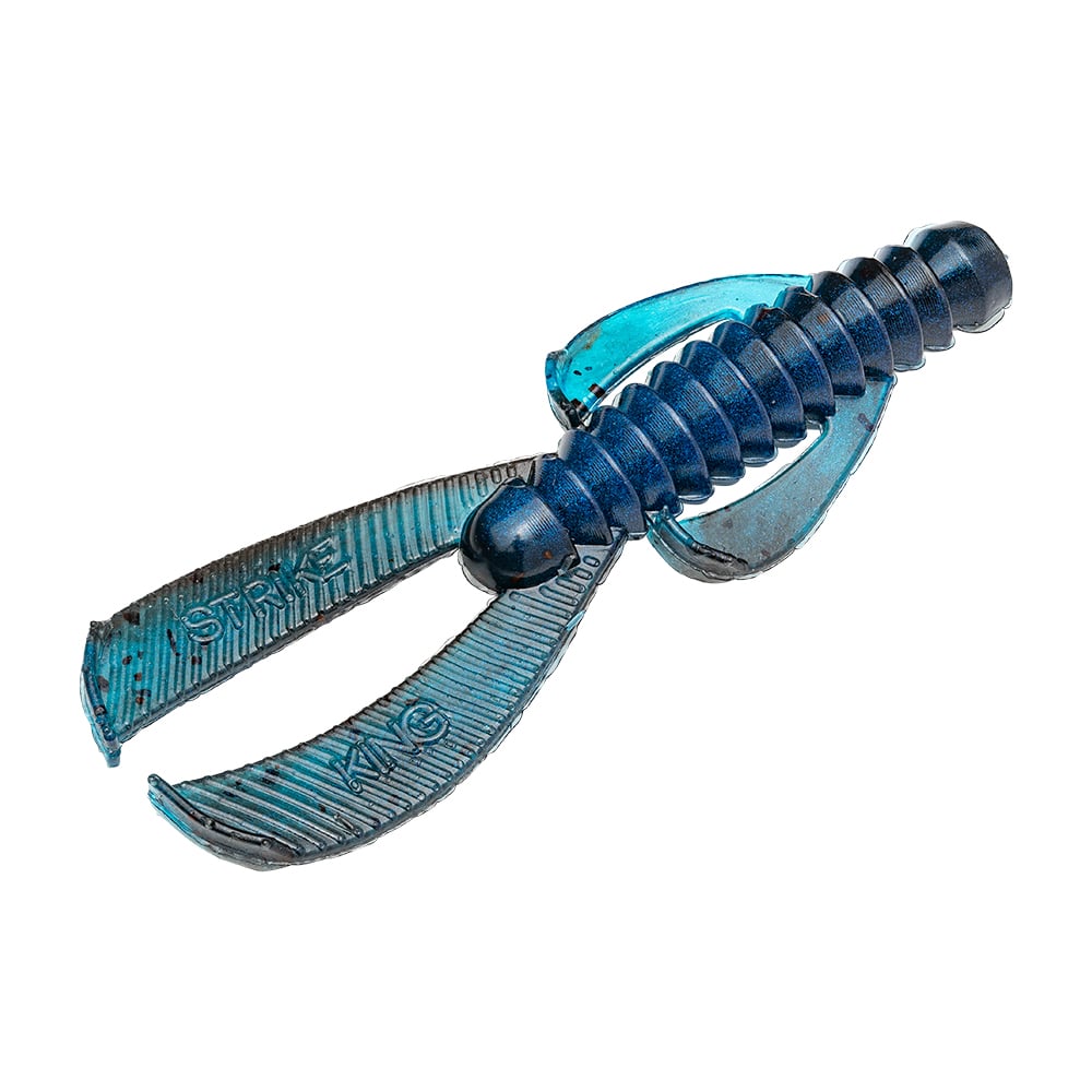 The Strike King Rage Ned Bug, by Strike King, is a blue and black soft plastic bait with a ribbed body and flat paddle-like appendages, designed to entice fish against a white backdrop.