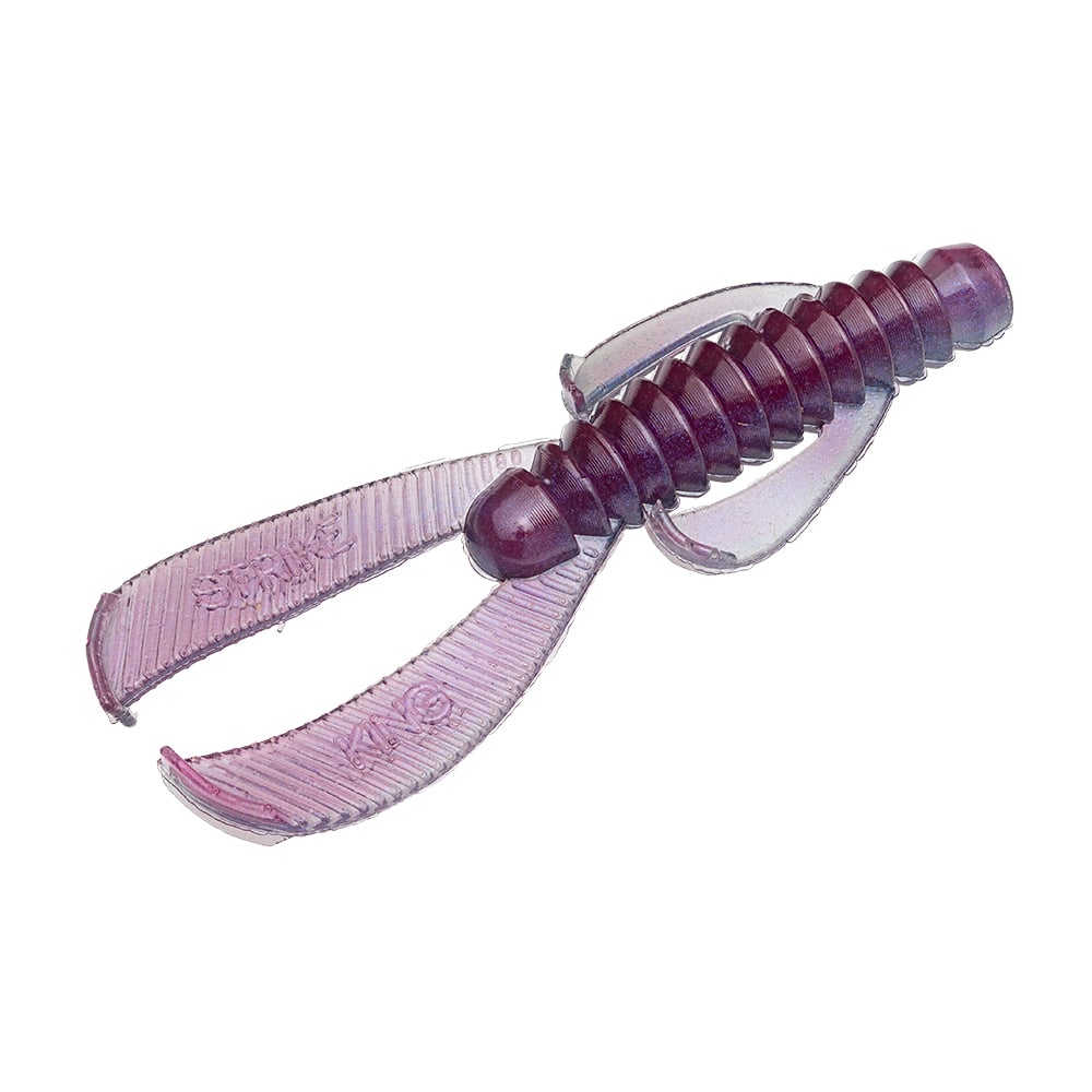 The Strike King Rage Ned Bug, a soft plastic bait in purple, has ribbed bodies and two curved flat appendages resembling claws. It imitates crawfish or insects, enhancing fish appeal.