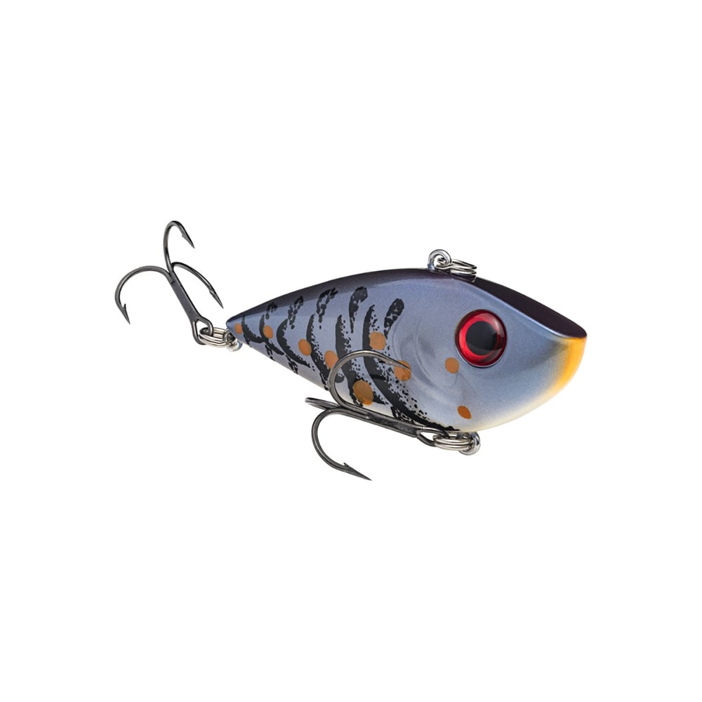 The Strike King Red Eye Shad by Strike King features a blue and gray body, red eye, orange spots, black patterns, and two treble hooks for pro tour anglers.
