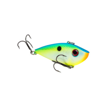 The Strike King Red Eye Shad is a vibrant lipless crankbait shaped like a small fish, featuring a blue top, yellow-green body, orange mouth, black spot, and two treble hooks—just like pro anglers use.